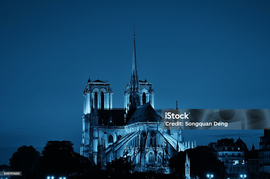 Notre Dame de Paris Notre Dame de Paris at dusk as the famous city landmark. Architecture Stock Photo