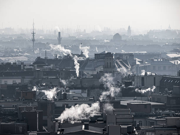 istock Smog - city air pollution. Unclear atmosphere polluted by smoke 635702150
