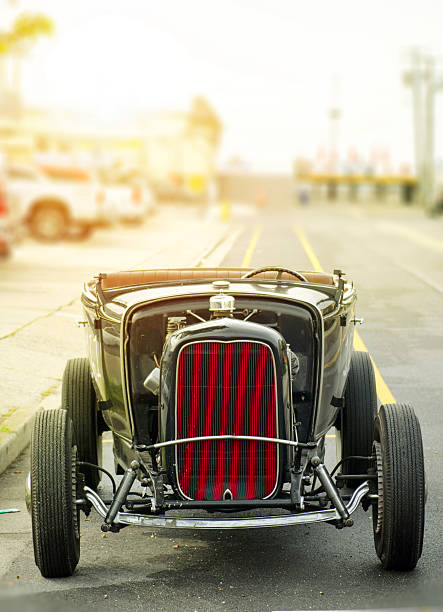 vintage black car on the street in the summer