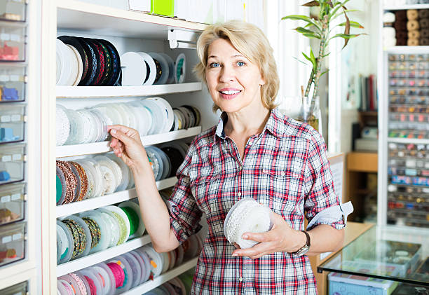 istock portrait of female customer standing next to different bands for 635714366