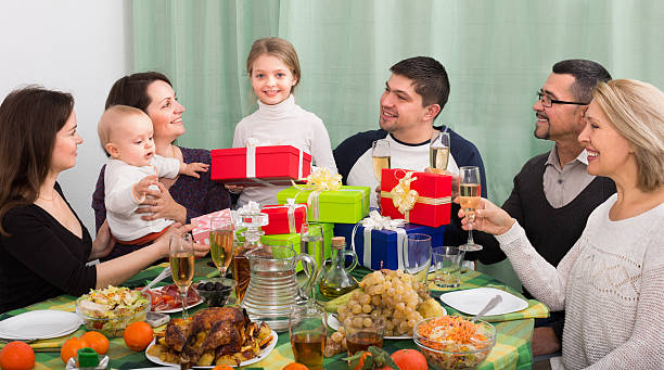 girl and her family celebrating - routine foods and drinks clothing household equipment imagens e fotografias de stock