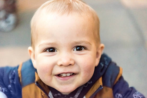 istock Smiling Baby boy looking at the camera 635715438