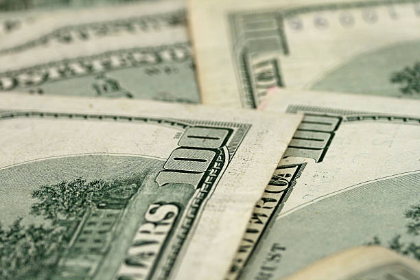 istock Rear Facing Hundred Dollar Bills Shot In Macro 635716300