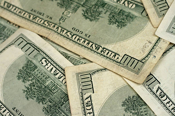 istock Rear Facing Hundred Dollar Bills Shot In Macro 635717260
