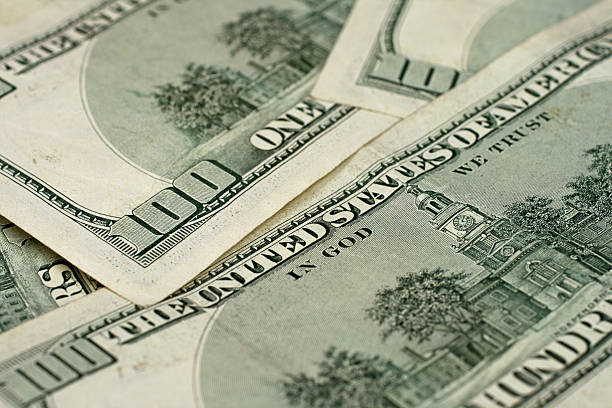 istock Rear Facing Hundred Dollar Bills Shot In Macro 635717554