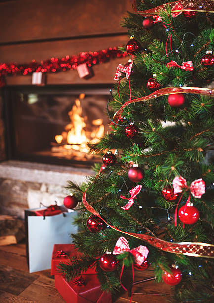 istock living room with christmas tree and the fireplace 635717596