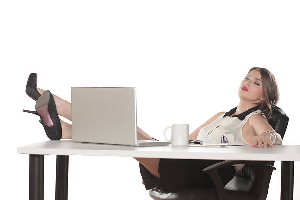 istock Tired business woman resting 635718080