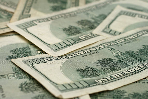 istock Rear Facing Hundred Dollar Bills Shot In Macro 635718132