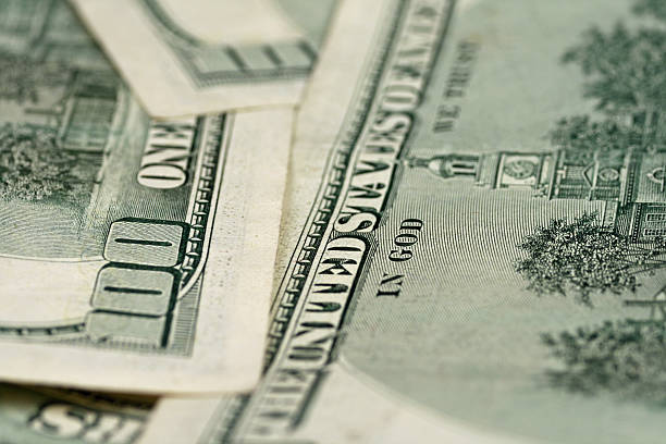 istock Rear Facing Hundred Dollar Bills Shot In Macro 635718164