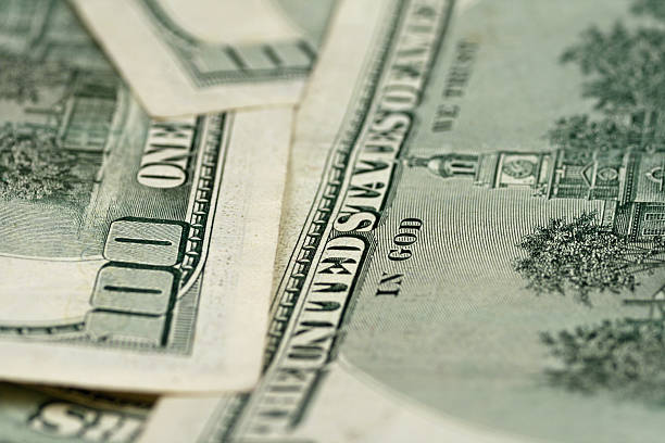 istock Rear Facing Hundred Dollar Bills Shot In Macro 635718246