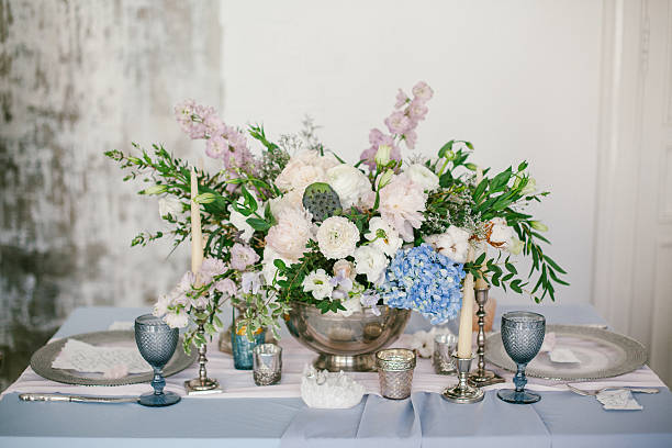 istock Silver candlestick and other elements of festive table wedding decorations. 635718376