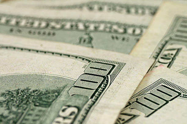 istock Rear Facing Hundred Dollar Bills Shot In Macro 635718424