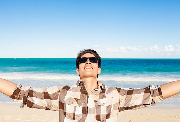 istock Men enjoying beautiful day at the beach. 635718514