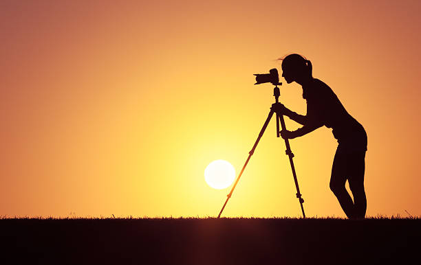 istock Female photographer 635719126