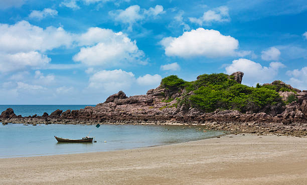 istock Fishing boat at clean beach 635720060