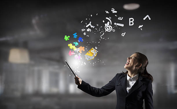 istock Businesswoman with tablet pc . Mixed media 635721114