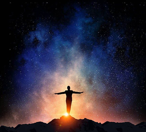 istock Businessman against starry sky . Mixed media 635721402