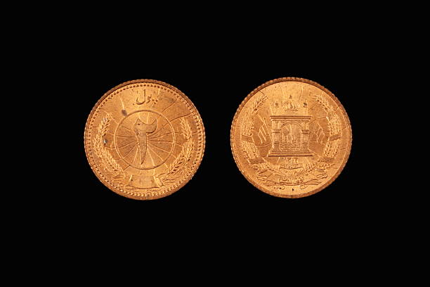 istock Old Arab Coin On A Black Background 635723590