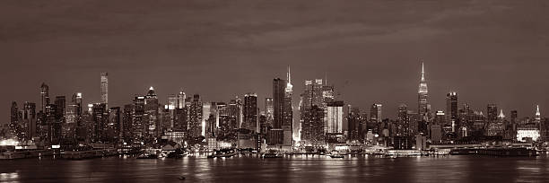istock Manhattan midtown skyline at night 635723666