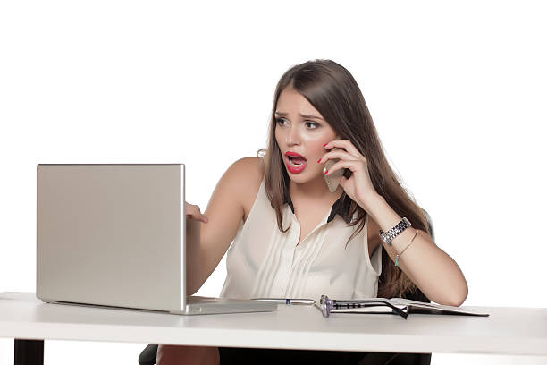 istock a young business woman with the laptop has a problem 635723734