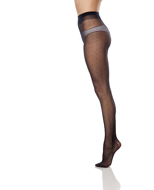 istock pretty female legs in black nylon tights 635724020