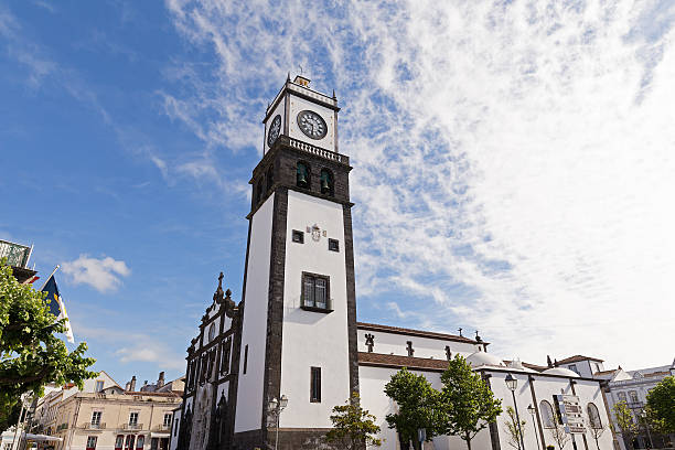 istock Beautiful church in early morning under white clouds. 635725342