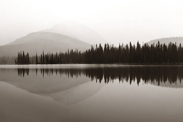 istock Foggy mountain lake 635726634