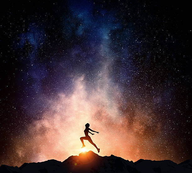 istock Jogger running at night . Mixed media 635729060