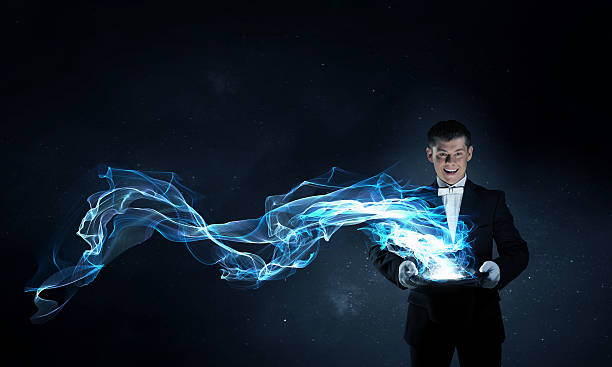 istock Businessman demonstrating magic . Mixed media 635731414