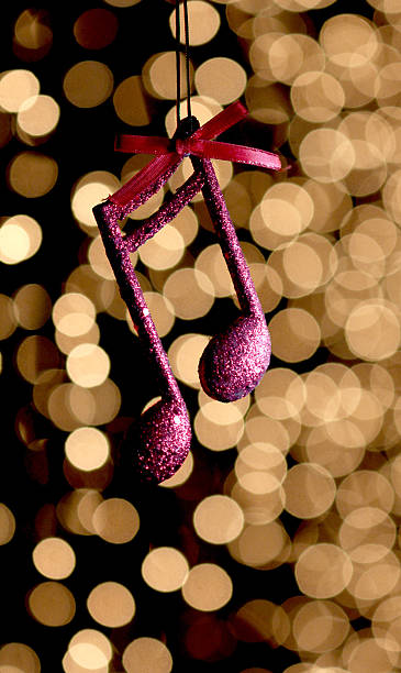 istock cristmas music note decoration in front of a bokeh lights 635733294