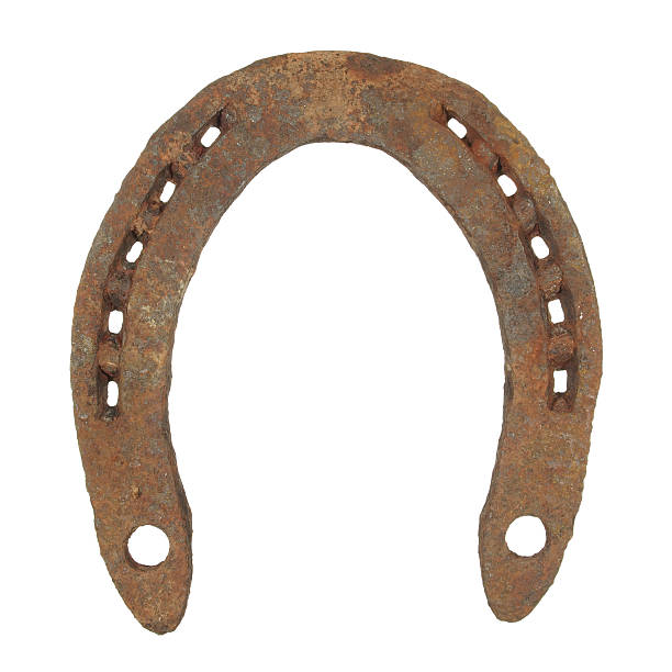 istock Old worn rusty steel horseshoe Isolated on white background 635740984