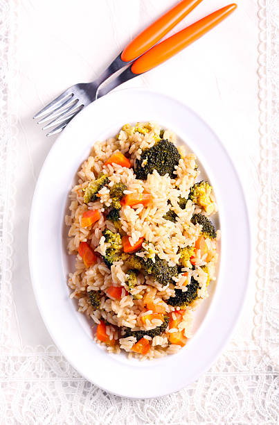 istock Broccoli and carrot rice served 635741358