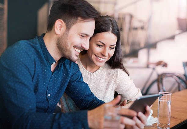 istock Young couple drinking cofee in a cafe 635742010