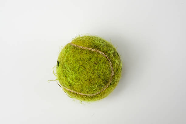 tennis ball old and dirty still life