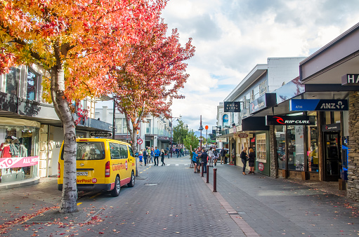 Queenstown,New Zealand - April 22,2016 : Street view of Queenstown in New Zealand.People can seen exploring around the street.