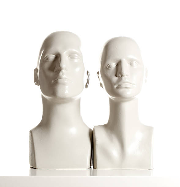 istock Male and Female Mannequin Heads on White 635755514
