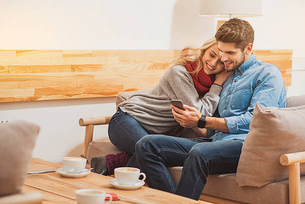 istock Joyful loving couple resting at home 635756824