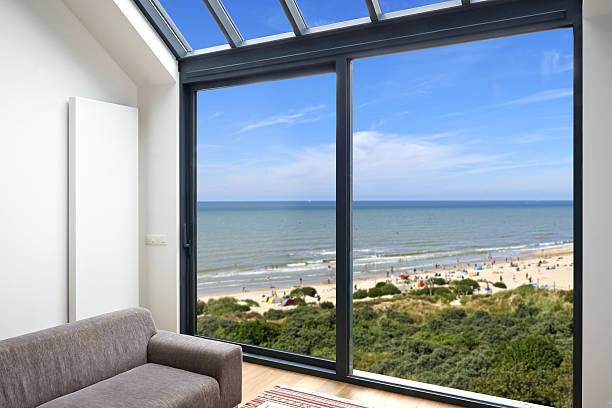 istock Room with large windows and view on seaside 635757152