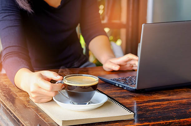 istock Business people working laptop with coffee on table. 635758636