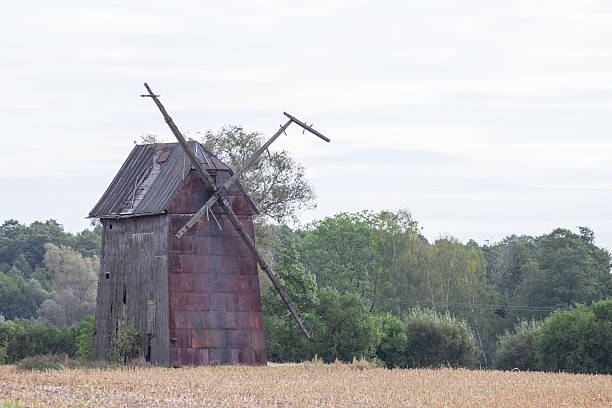 istock Kawnice, Poland. Old ruined windmill on the field. 635764396