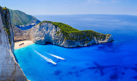 Zakynthos shipwreck beach. Navagio Bay panorama. Blue water. Touristic attraction.