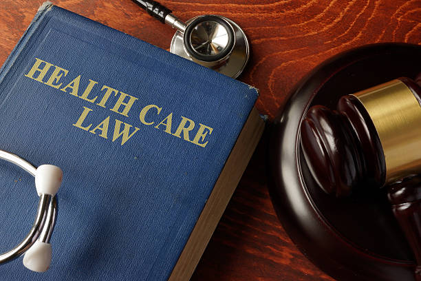 istock Book with title Health Care Law on a table. 635768254