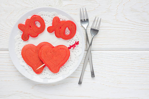 istock Red velvet pancakes with xo sign, top view, copy space 635770866