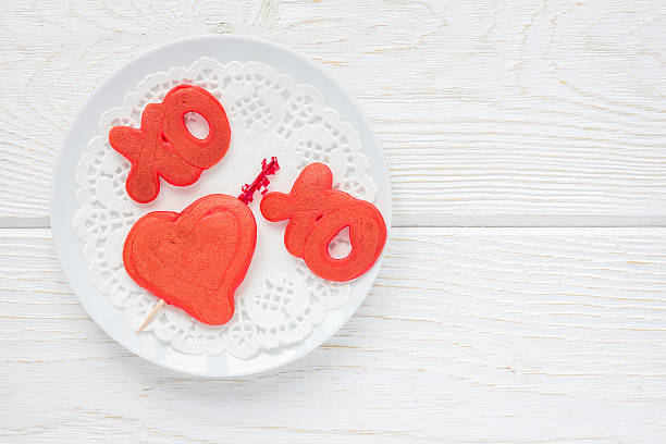 istock Red velvet pancakes with xo sign, top view, copy space 635770898