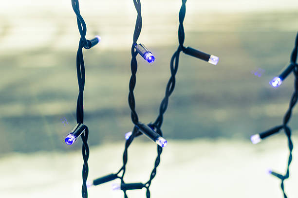 istock Blue christmas decoration or garland lights. Holiday 635773948