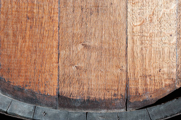 istock Closeup of old oak barrel. Front view. 635774958