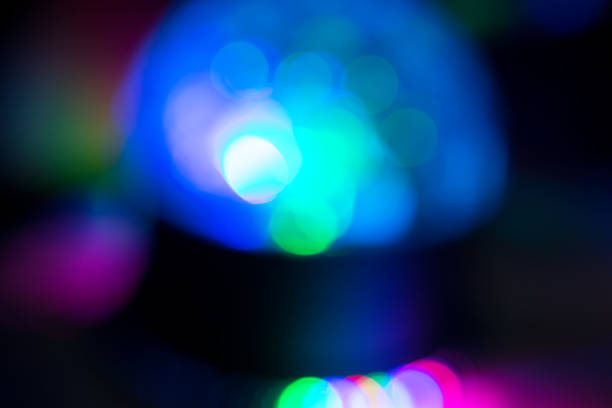 istock Abstract defocused blurry holiday bokeh texture background - Christmas 635776400
