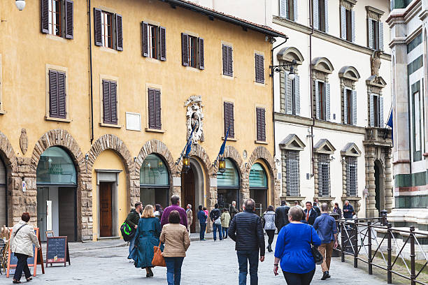 Florence, Italy - November 4, 2016: tourists near Museo dell Opera del Duomo (Museum of the Works of the Cathedral) in Florence city. Museum containing the original works of art created for Duomo
