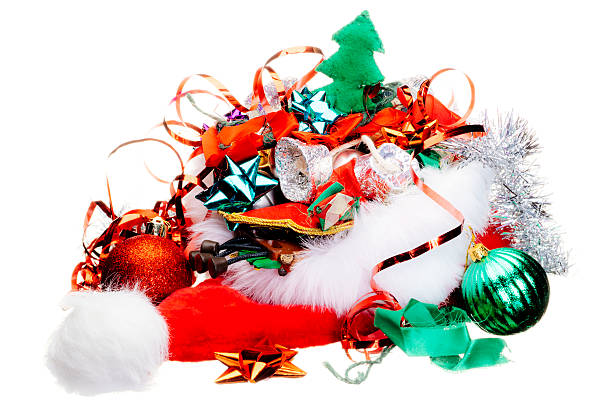 Christmas decorations in a heap inside a santa hat after the celebrations are finished. AdobeRGB colorspace.
