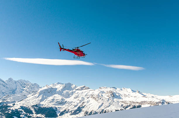 Swiss helicopter rescue in the mountains Swiss helicopter rescue in the mountains jungfrau stock pictures, royalty-free photos & images